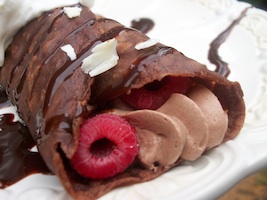 chocolate mousse and raspberries in chocolate crepes