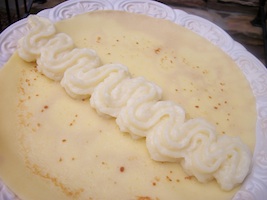 flat crepe with a row of coconut cream down the middle