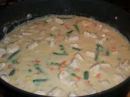 chicken pot pie crepe filling in a pan