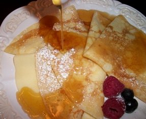 vanilla maple syrup poured over buttermilk crepes