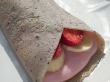 wild berry crepes with yogurt and fresh fruit filling