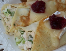 Mini Crepes filled with Chicken Salad and Topped with Melted Brie