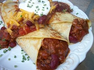 Chili Crepes with Cheddar and Sour Cream Topping