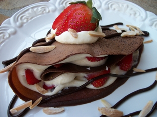 strawberry almond cheese in dark chocolate crepes
