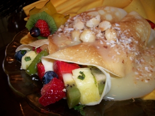 tropical fruit crepes with white chocolate sauce