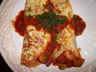 Shrimp, Sausage, and Mushrooms in Cornmeal Crepes